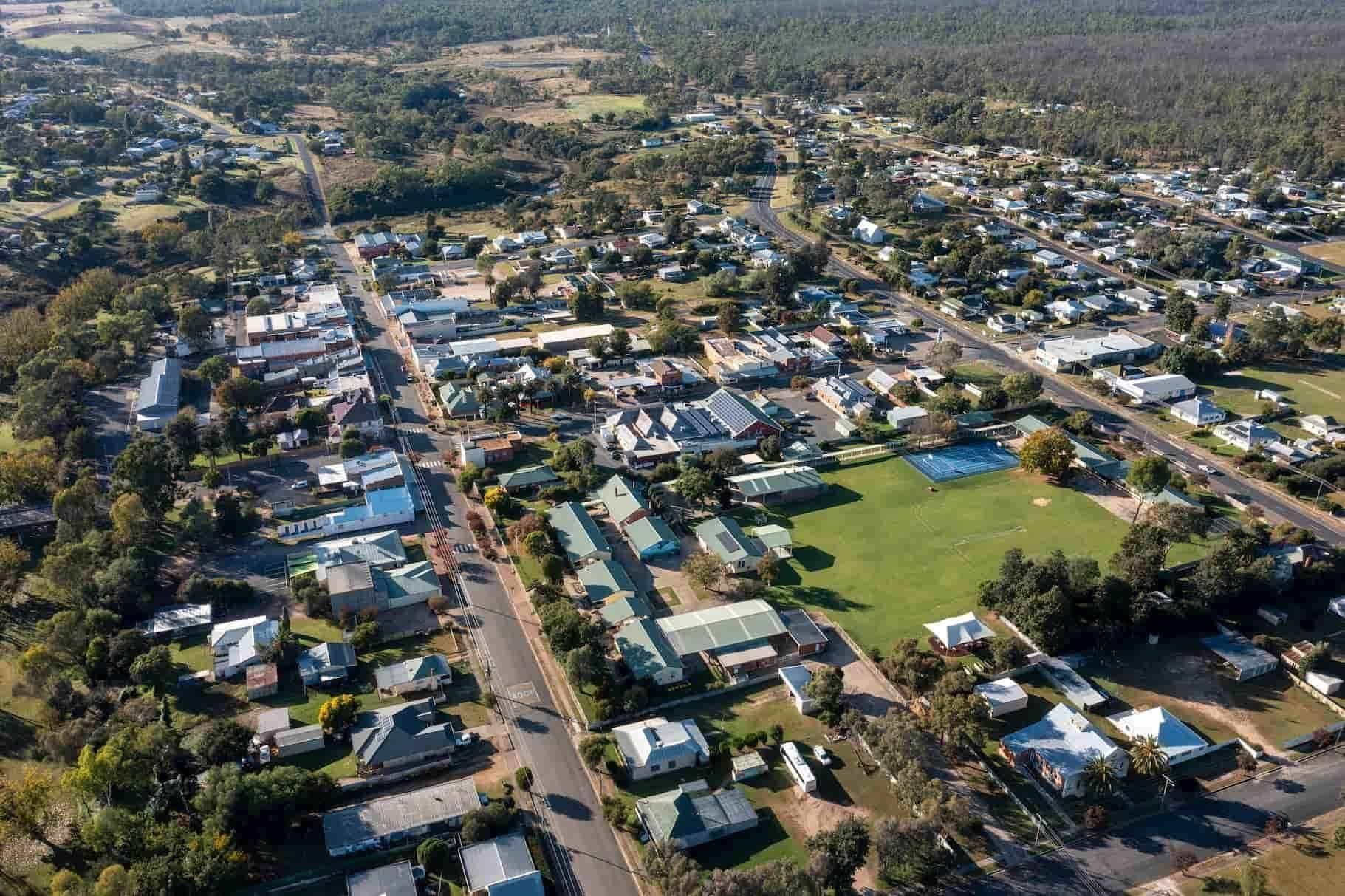 An Aerial View of A Small Town with Lots of Houses and Trees — Lifestyle Demolition In Brunswick Heads, NSW