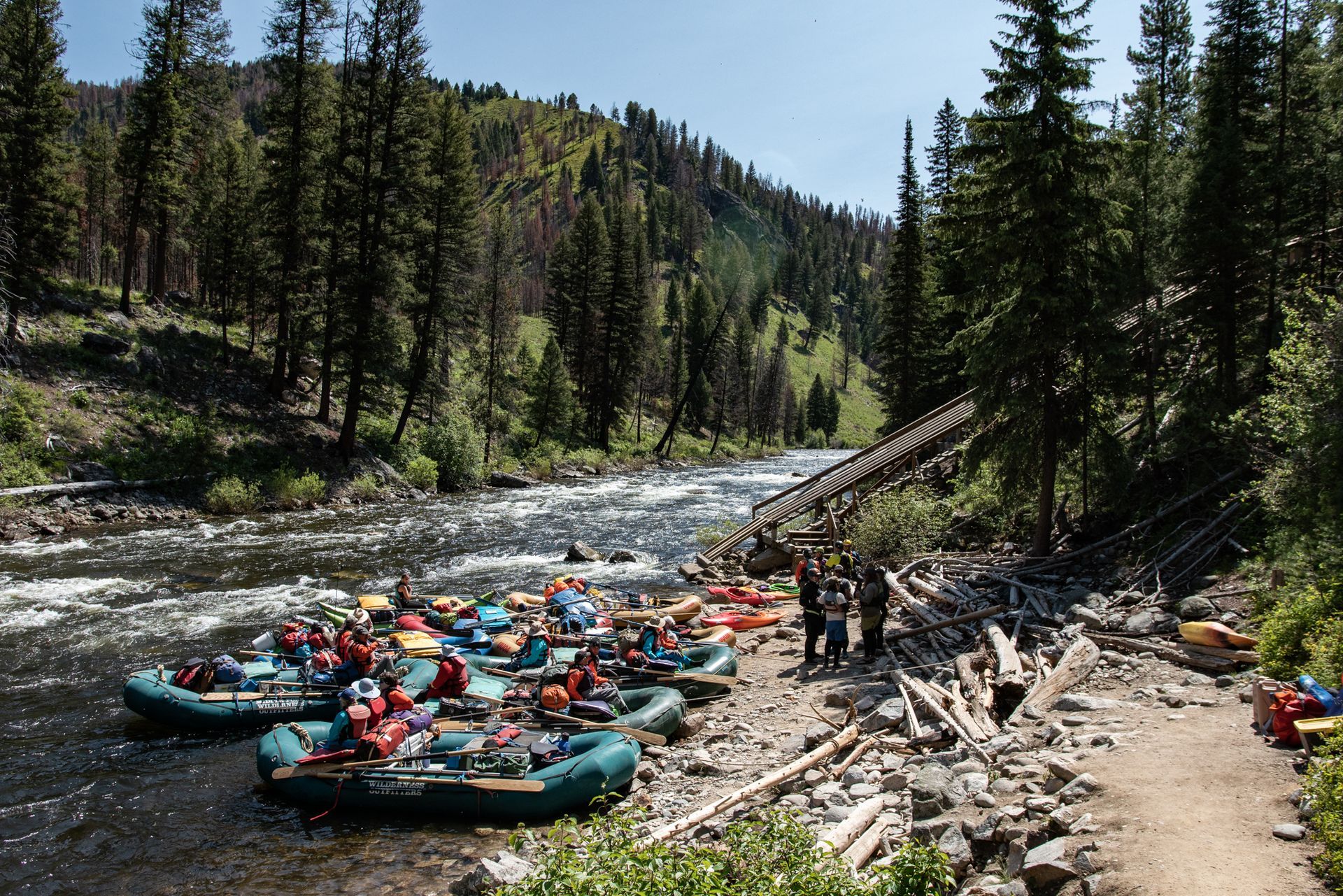 A group of people are rafting down a river.