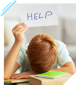 A young boy is holding a help sign over his head