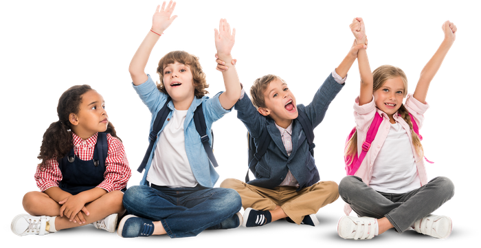 A group of children are sitting on the floor with their arms in the air.