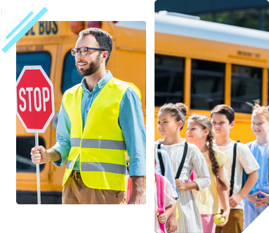 A man in a yellow vest is holding a stop sign in front of a school bus.