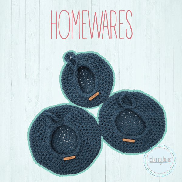 Image of three crocheted storage baskets in petrol blue