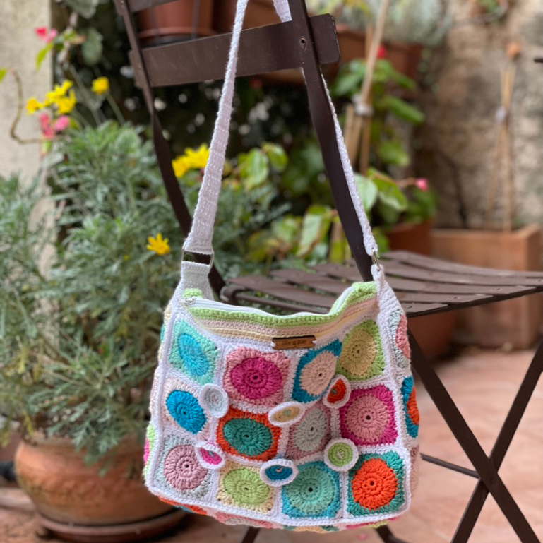 Sandy Bag. Multi-coloured, crochet bag with long handle and zipper fastening. Fully lined.