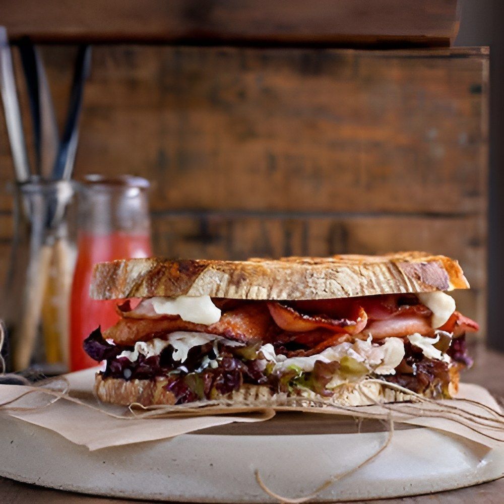 A Close Up of a Sandwich on a Cutting Board — Corrado & Frank Distributors in Illawarra, NSW