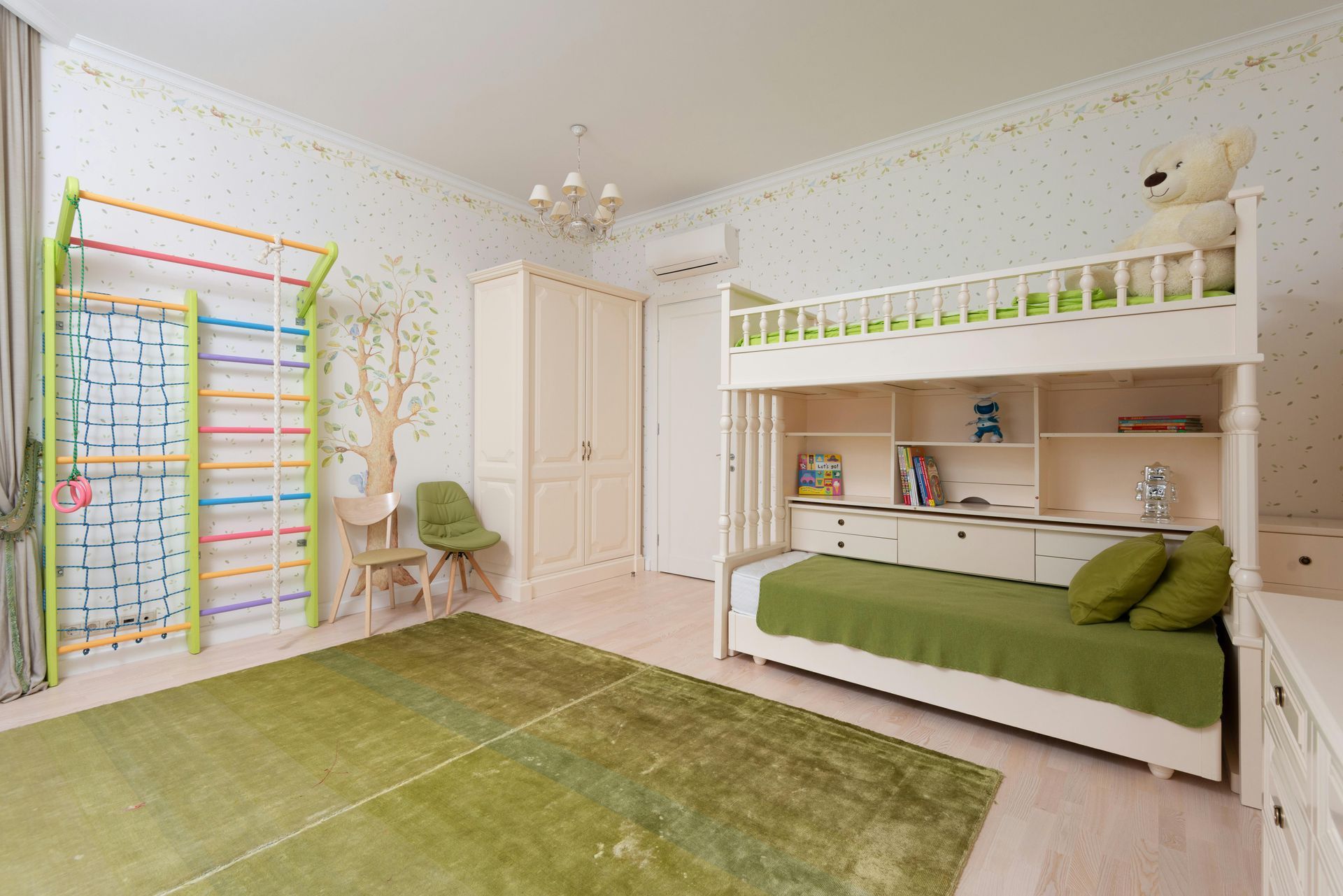 Child's bedroom with bunk bed, play gym, and green rug. White furniture and light green accents.