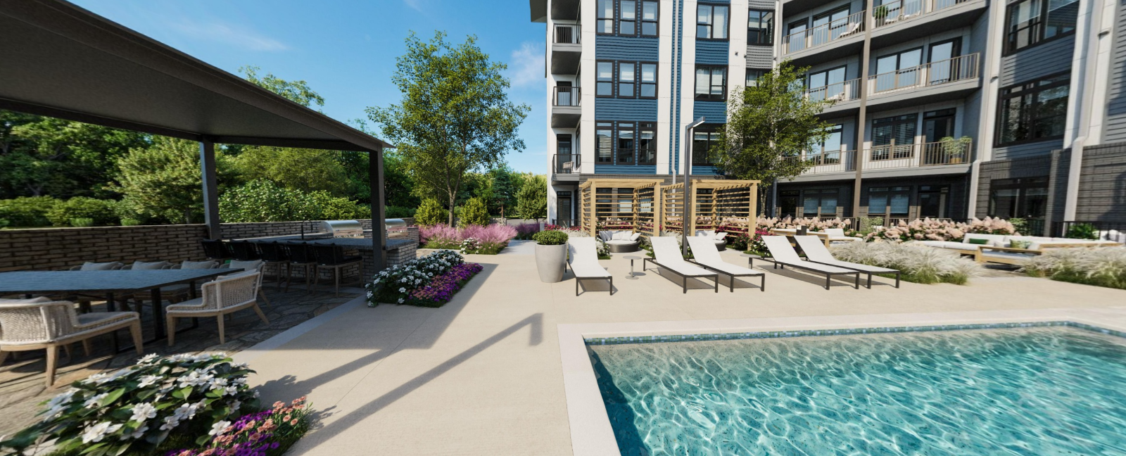 Modern apartment pool deck with lounge chairs, shaded seating, and landscaped planters at Vela Park apartments in East Lake, Atlanta, GA.
