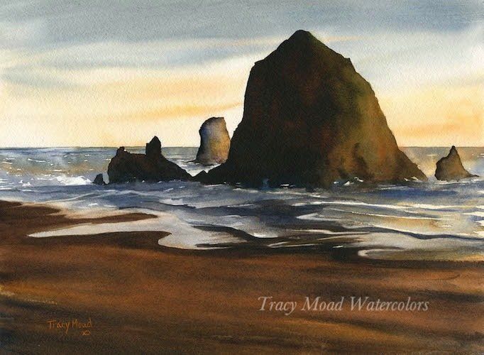 Watercolor painting of ocean rocks at sunset. Brown and blue hues dominate the scene, with a large, dark rock formation center stage.