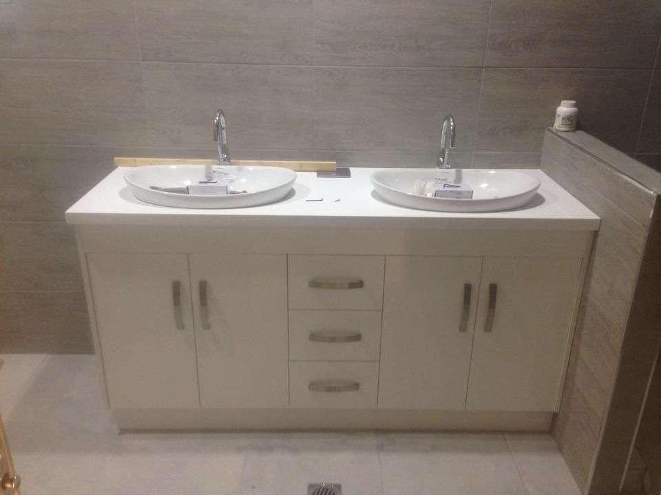A Bathroom Vanity With Two Sinks And Two Faucets — Keilbach Kitchens In Garradunga, QLD