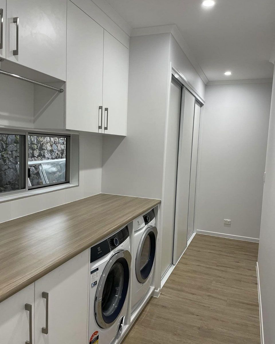 A Laundry Room With A Washer — Keilbach Kitchens In Garradunga, QLD