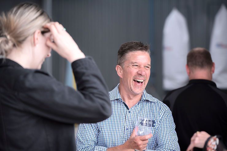 A Man Socializing with Others | Upper Hutt, NZ | Hui Kitchens