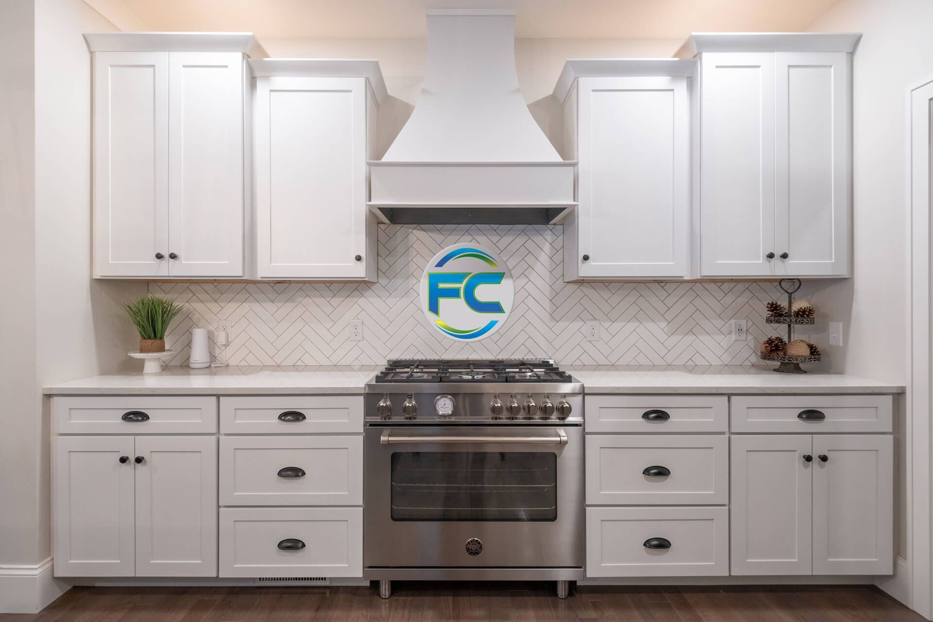 A kitchen with white cabinets, stainless steel appliances, and a stove that has been cleaned