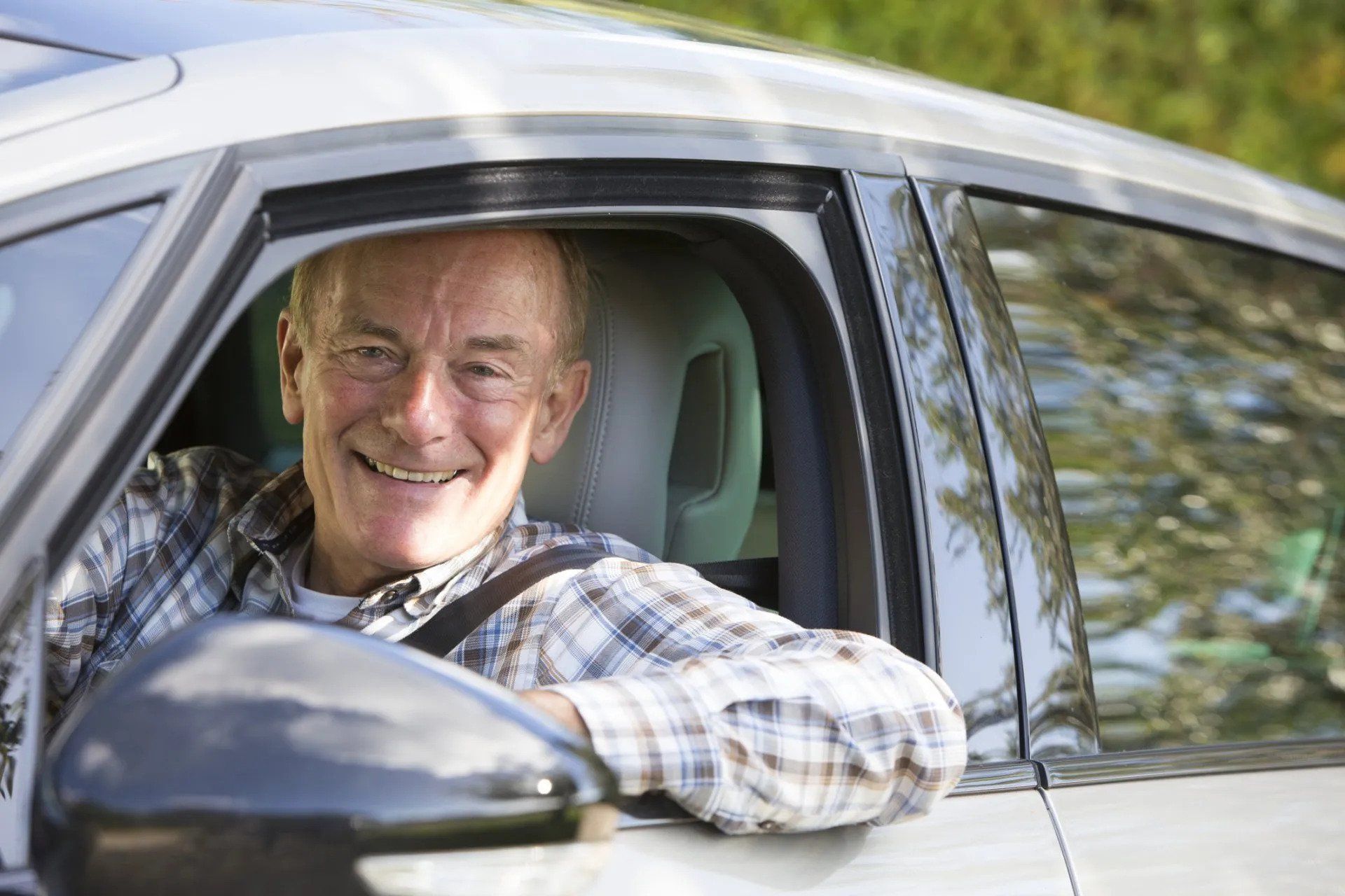 Senior Smiling While Driving — Tucker, Ga — Taggart's Driving School
