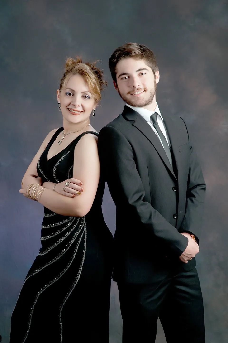 Woman in Black Dress and Man in Black Suit