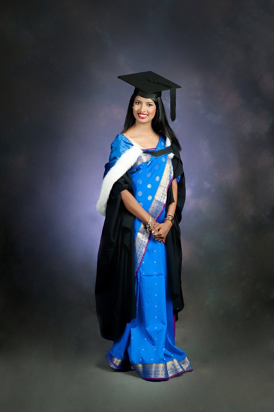 Woman in a Blue Gown with Dark Background