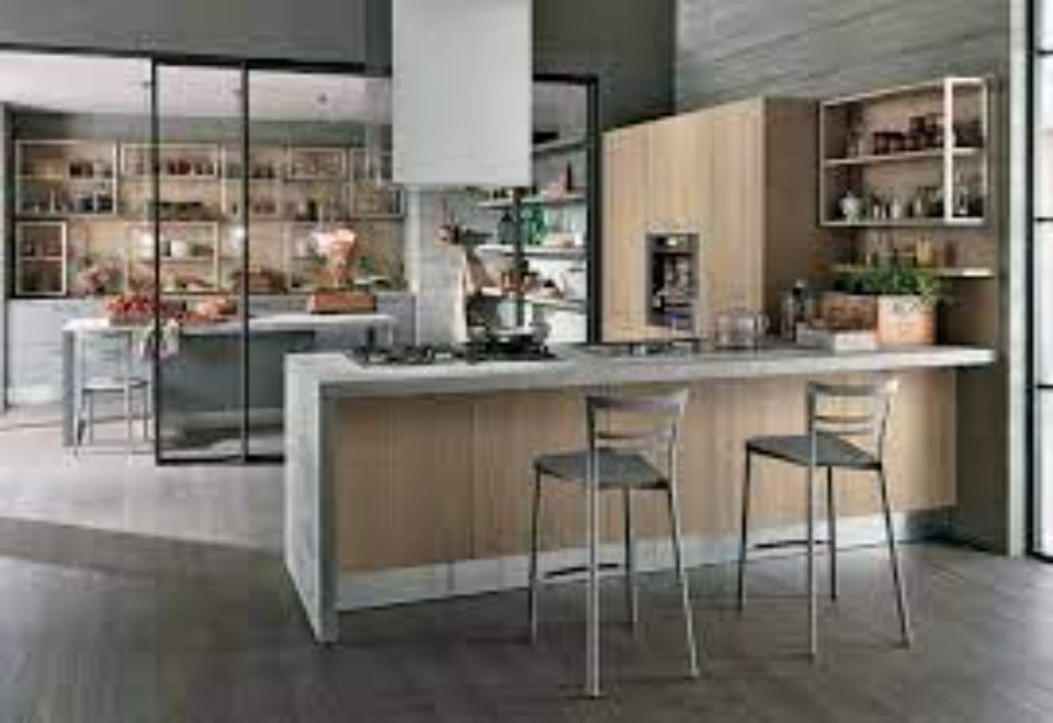 tavolo con sedie a sgabello