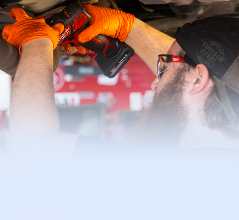 Technician performing auto repairs in Grandview, MO | Jerry's Auto Repair