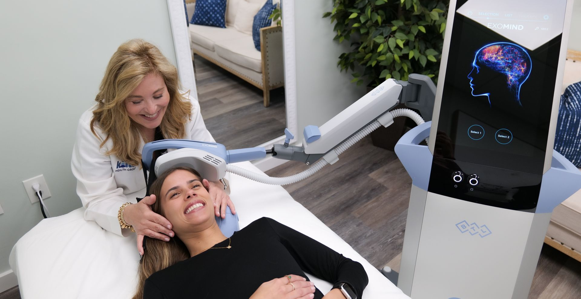 Woman receiving brain stimulation treatment; doctor smiling. Blue and white equipment in medical office.