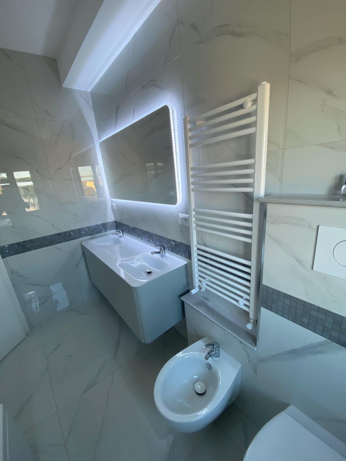 dettaglo lavandino e termoarredo