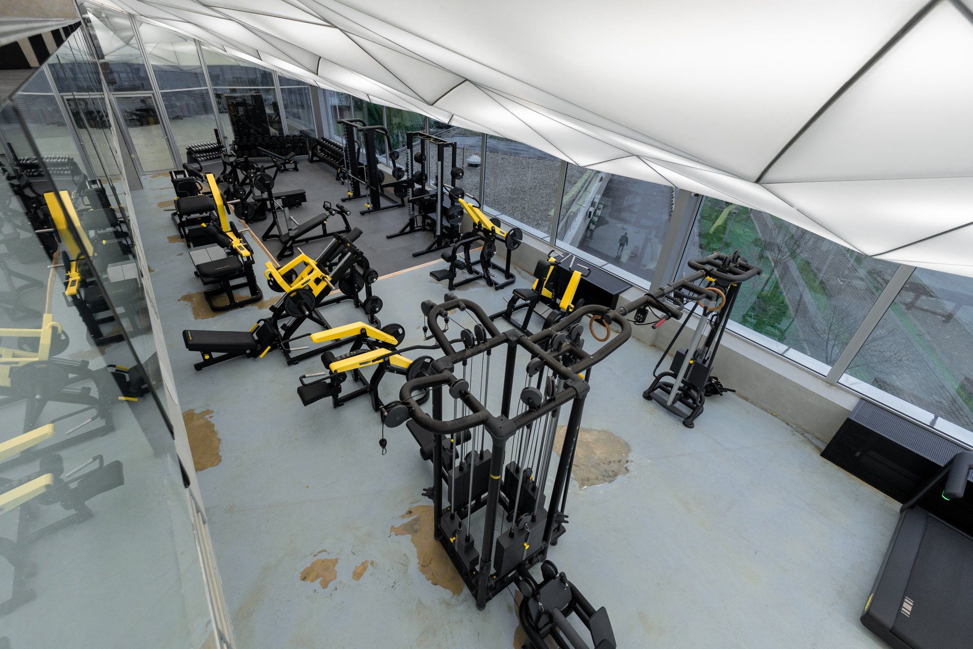 an aerial view of a gym with lots of exercise equipment