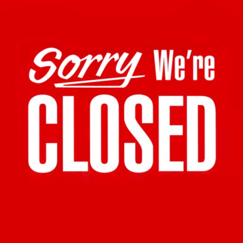 A red sign that says sorry we 're closed