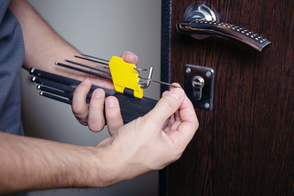 locksmith checking the lock