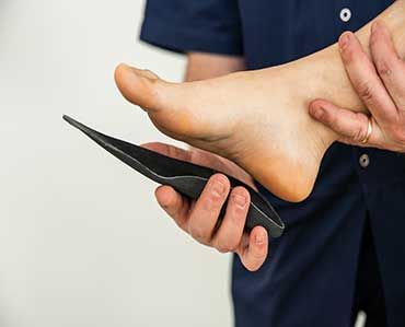 Doctor specializing in plantar posturology