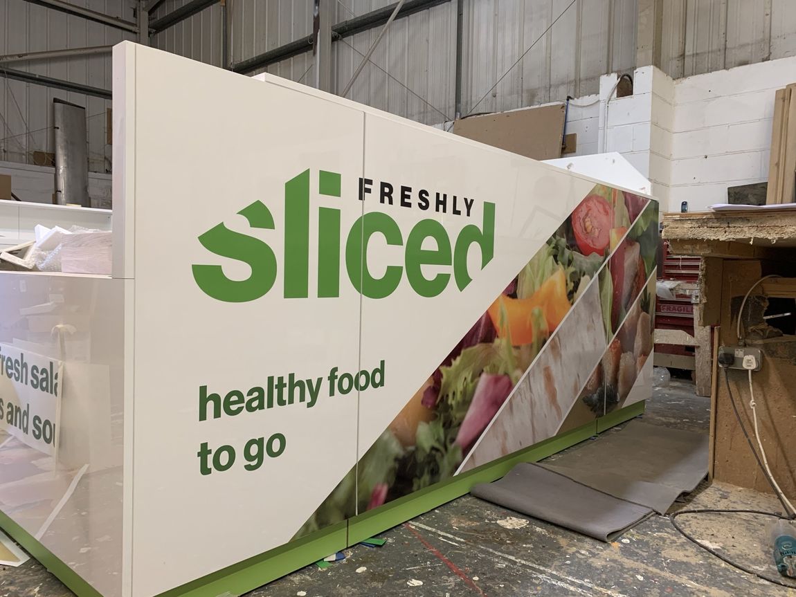 Cut and printed vinyl graphics applied to custom manufactured food bar