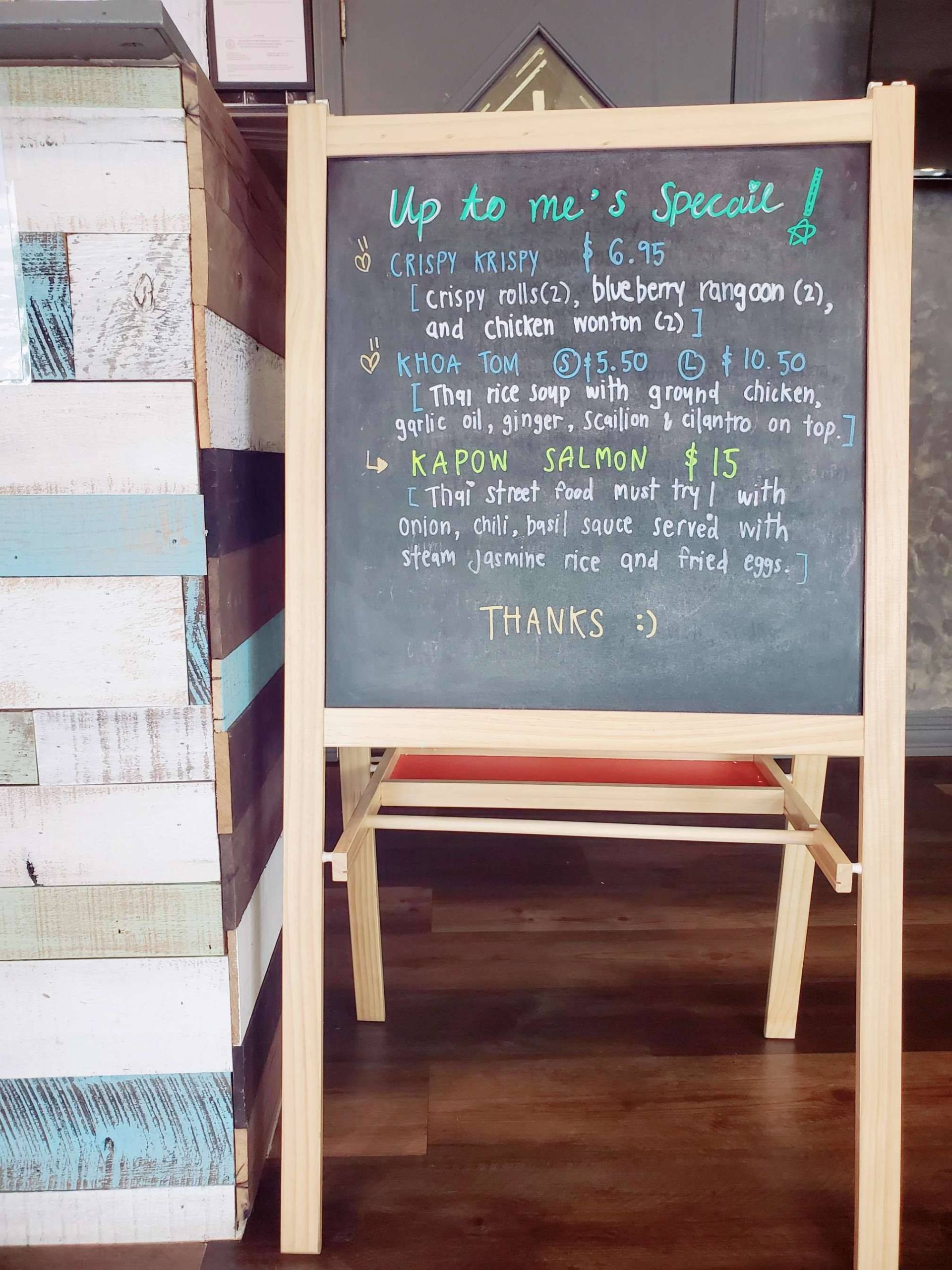 A chalkboard with the words up to the 5 specials written on it