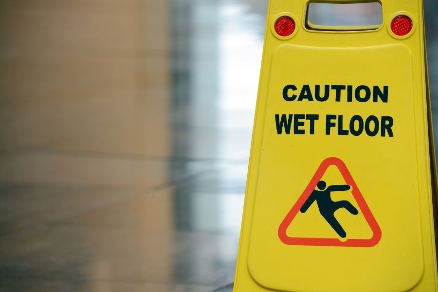 Slippery wet floor with water damage