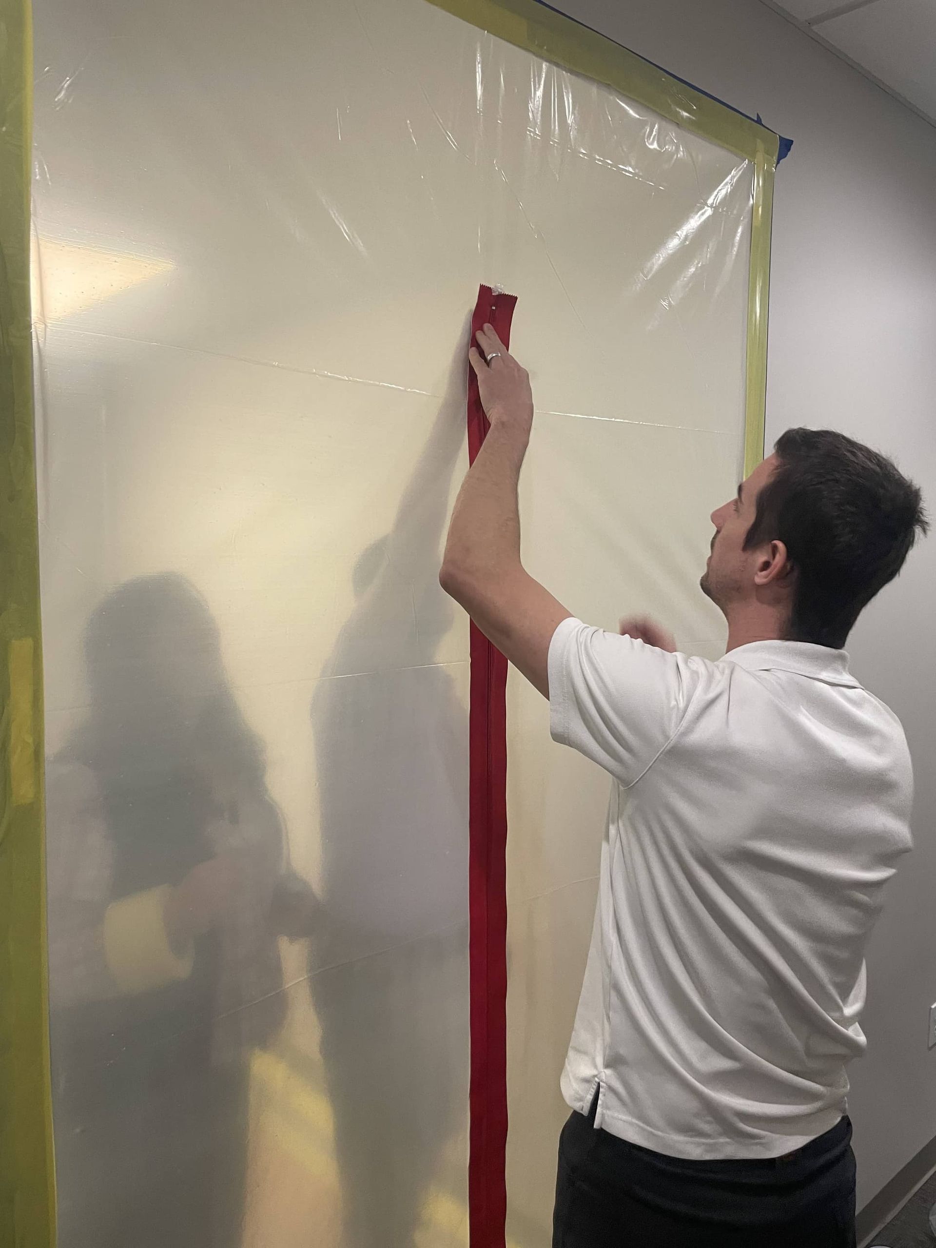 True North Professional working on water damage containment in a Wildwood home