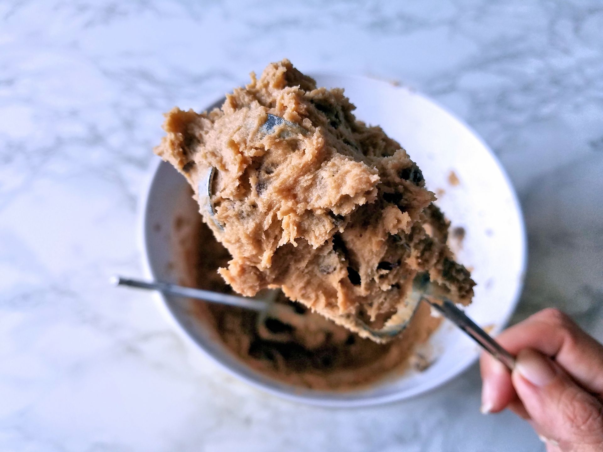 Raw cookie dough on a mixer