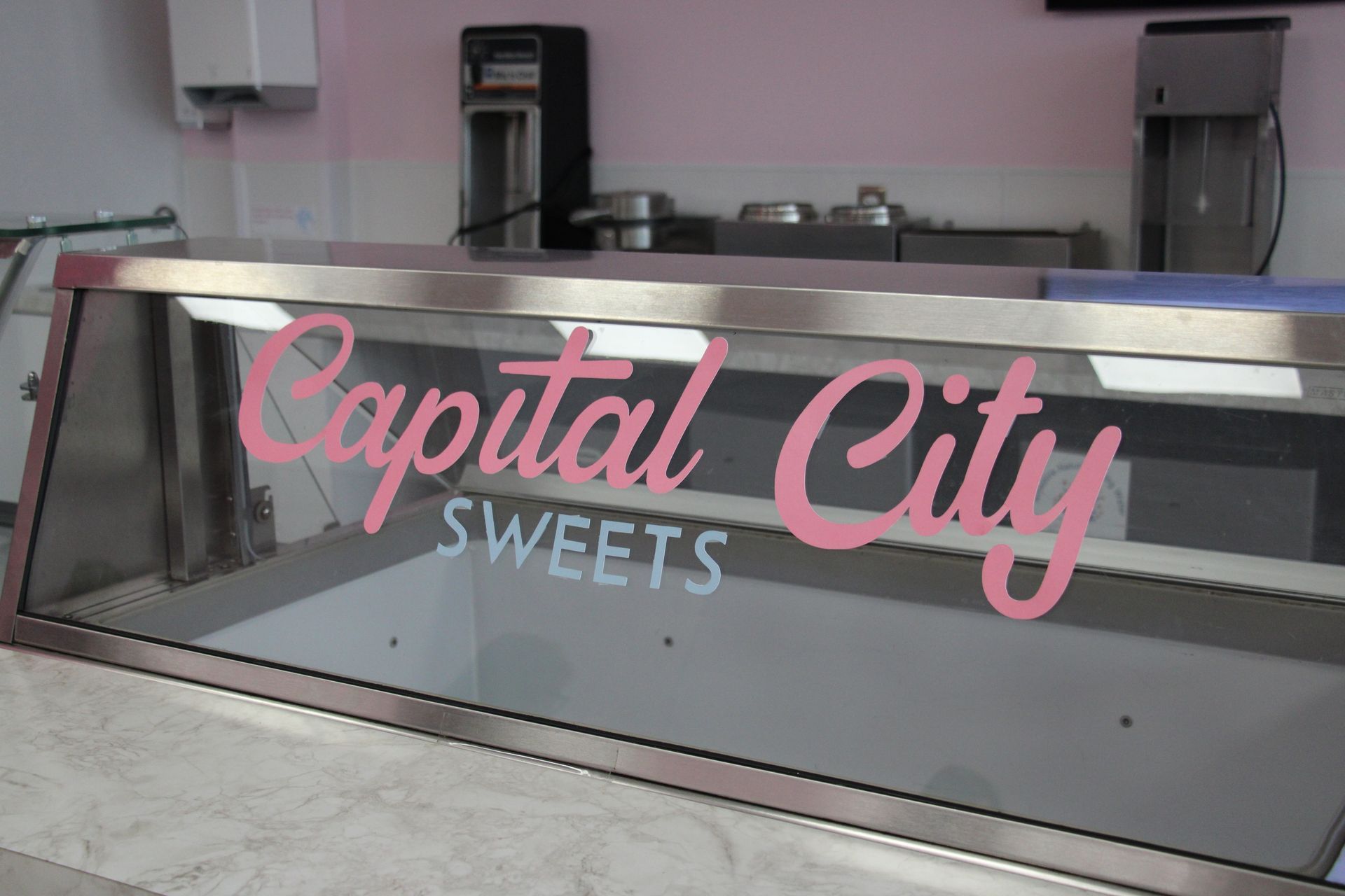 A display case for capital city sweets in a store