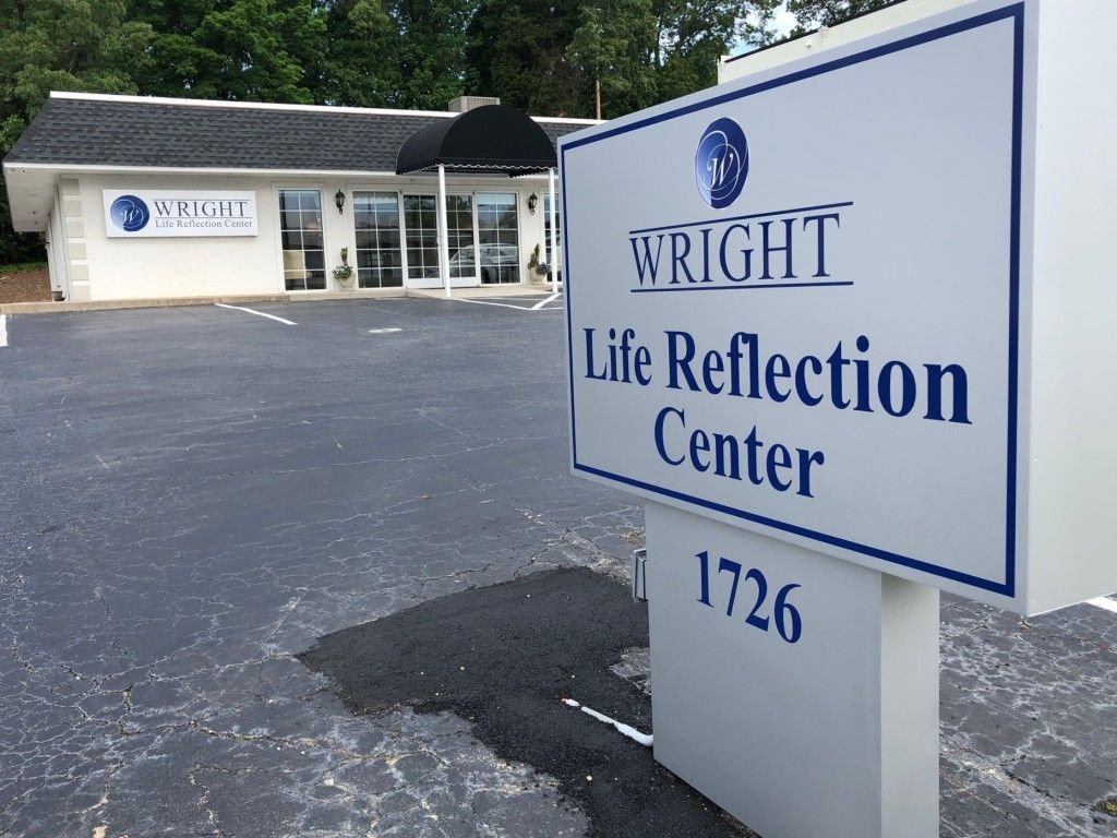 A sign for the wright life reflection center