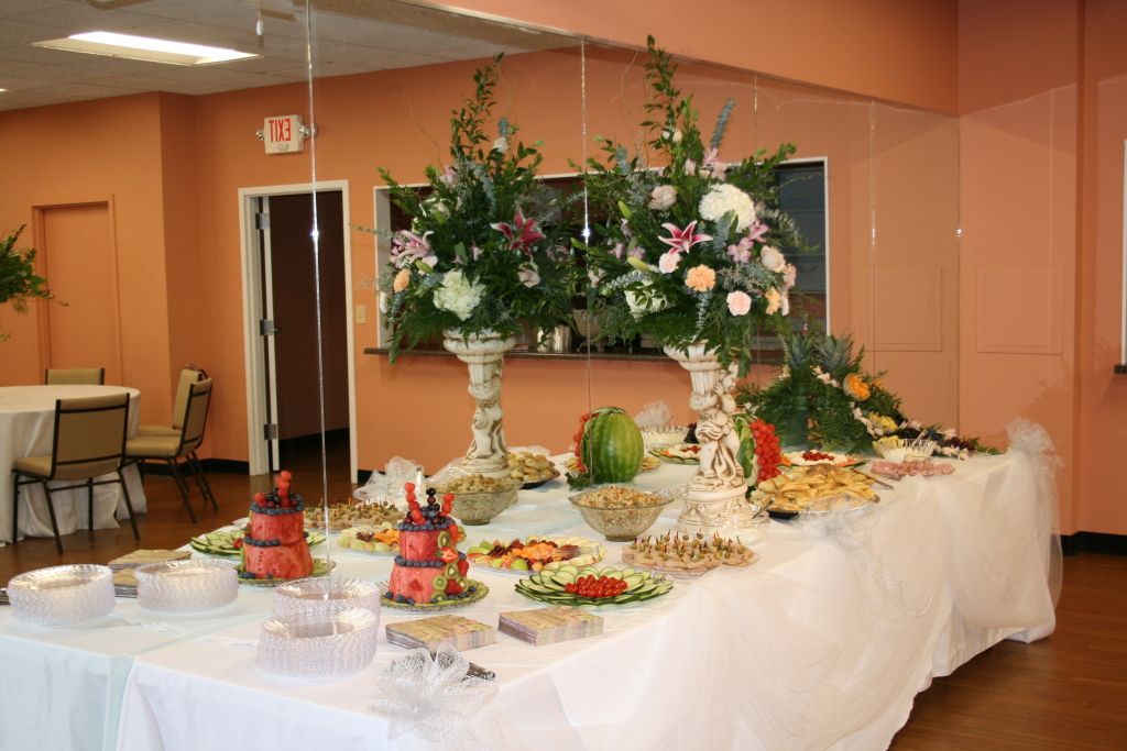 A long table with a lot of food on it