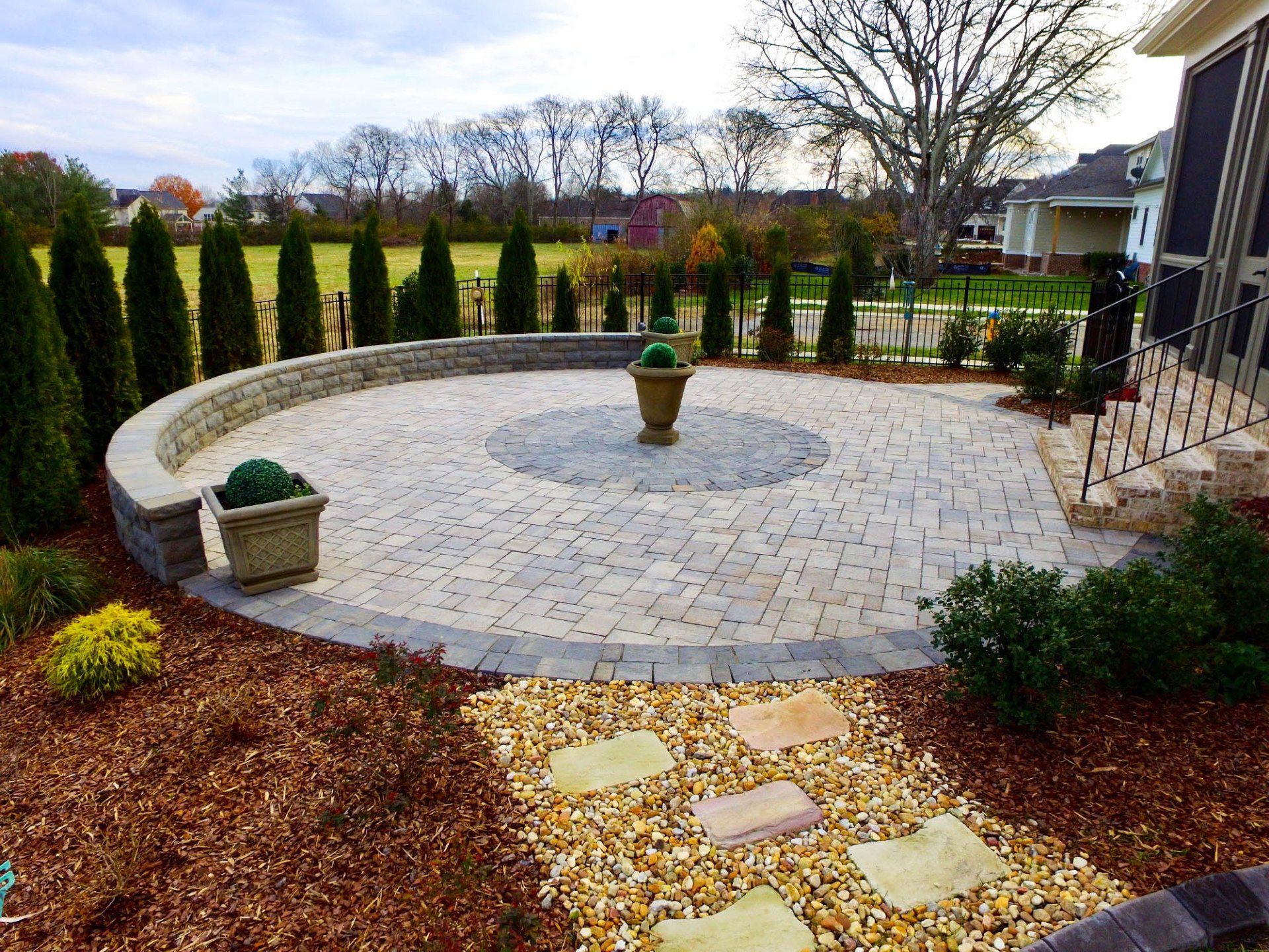 Hardscape Circle Patio with Landscaping Surrounding it
