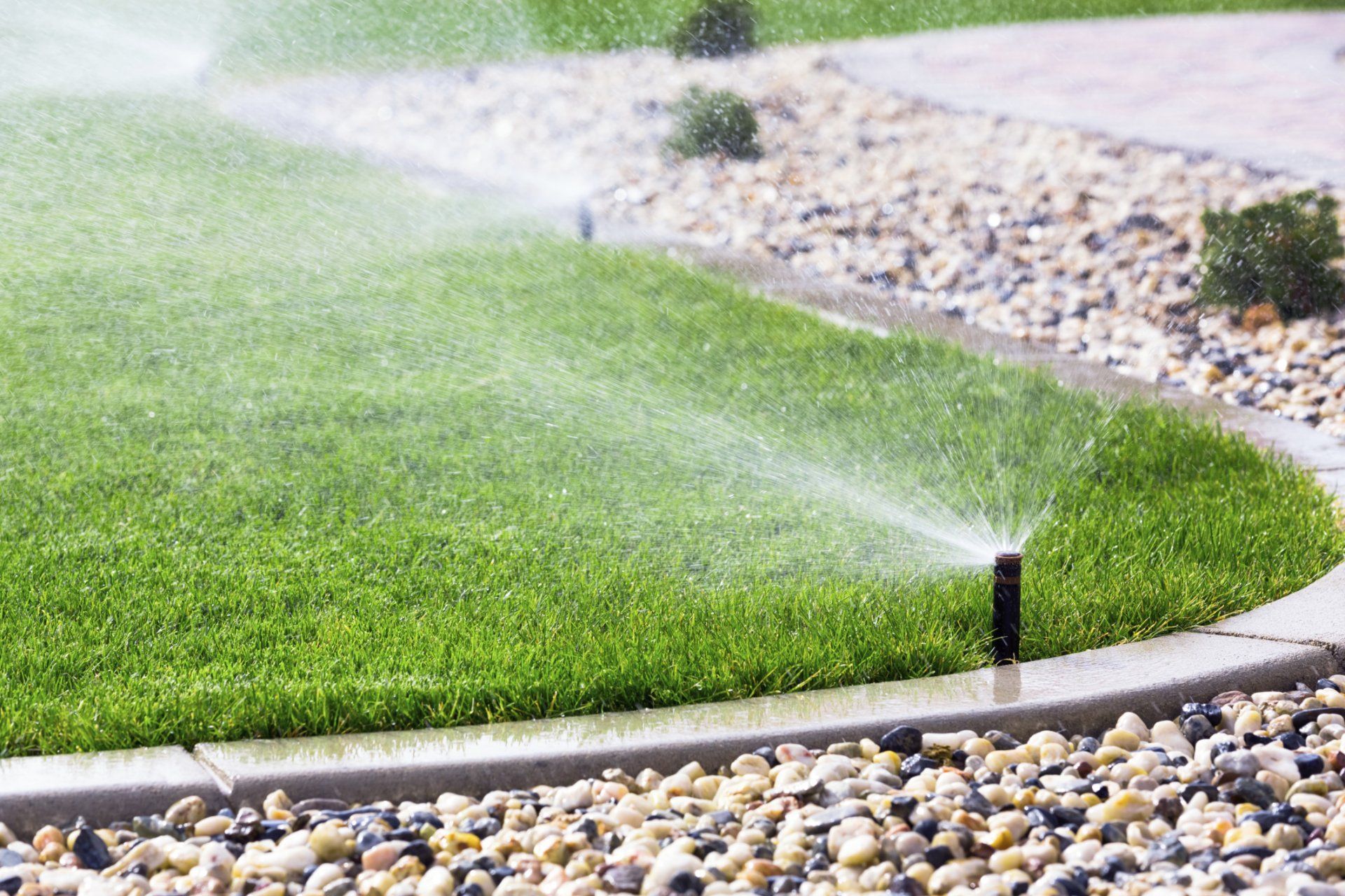 Irrigation / Sprinkler system in use in yard