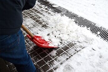 Snow Removal with Red Shovel — Lawn Care in Moseley, VA