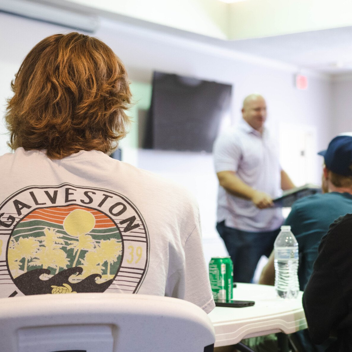 College student reads the Bible at Crosspoint Fall Retreat.