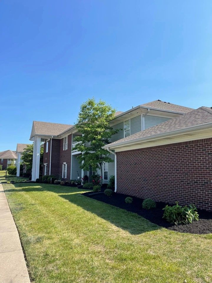 A large brick apartment building with a lush green lawn in front of it – Mt. Washington, KY - Beck’s