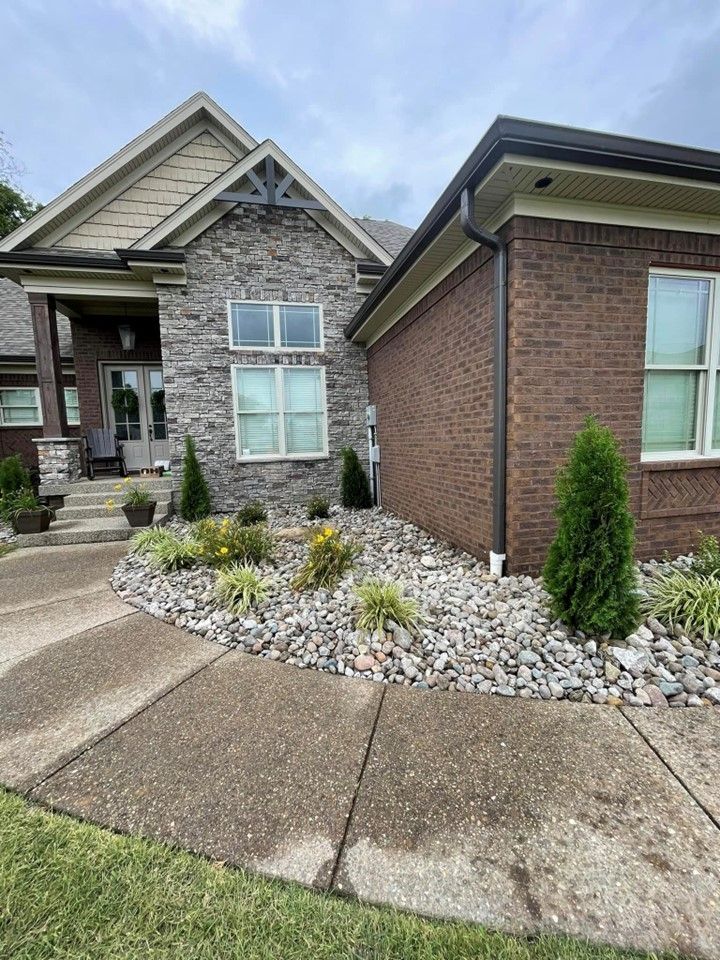 A brick house with a stone facade and a walkway leading to it – Mt. Washington, KY - Beck’s