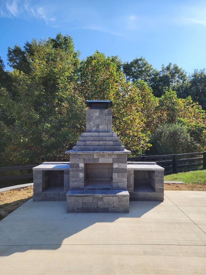 A stone fireplace is sitting on top of a concrete patio – Mt. Washington, KY - Beck’s