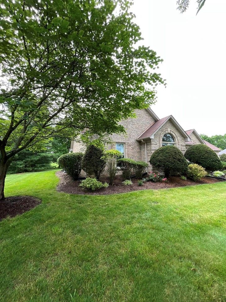 A large house with a lush green lawn and trees in front of it – Mt. Washington, KY - Beck’s