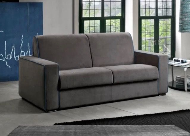 divano letto modello papeete grigio lineare con bordini a contrasto e tessuto sfoderabile da tronu arredamenti a cagliari