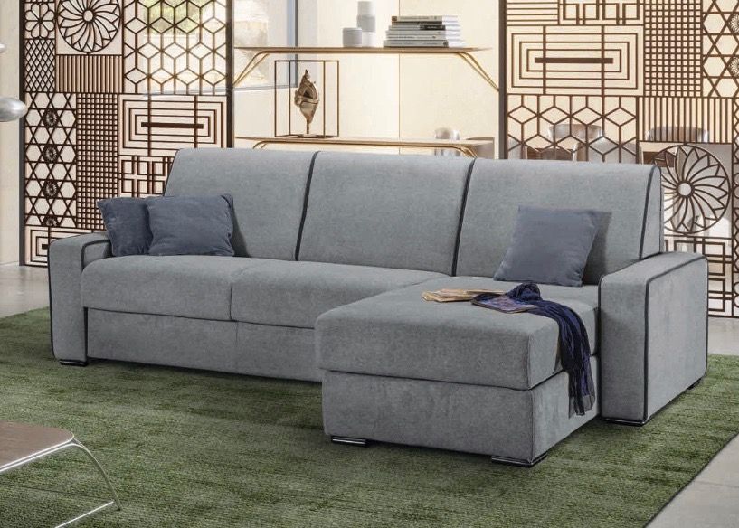 divano letto papeete grigio ad angolo con penisola da tronu arredamenti a cagliari