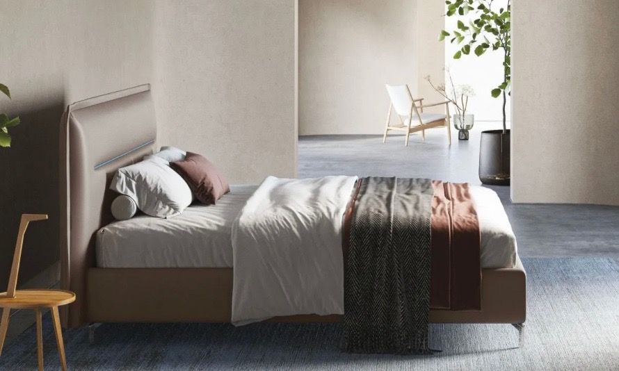 letto sommier dorelan con testiera trapuntata e fascione alto