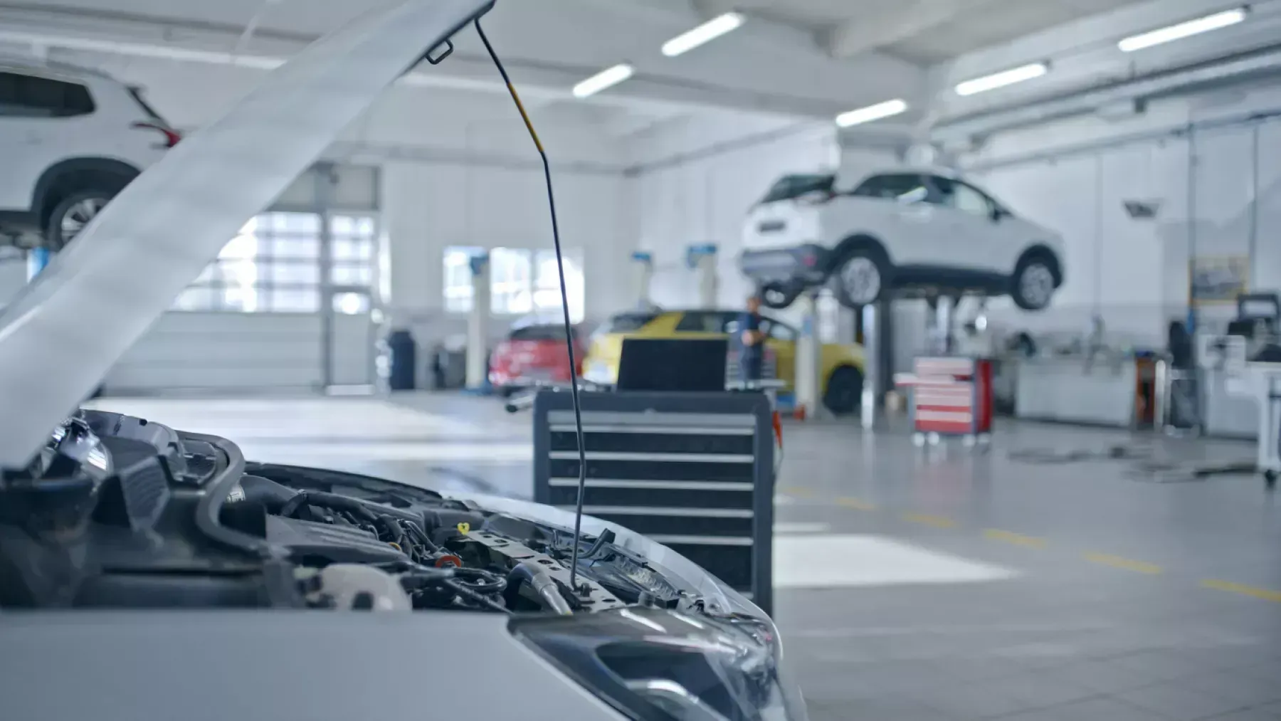 Cars in a garage being repaired