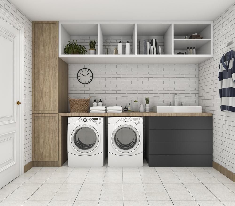 Laundry Room With Washer, Dryer, Cabinets, And White Brick Wall — BC Customs in Port Macquarie, NSW