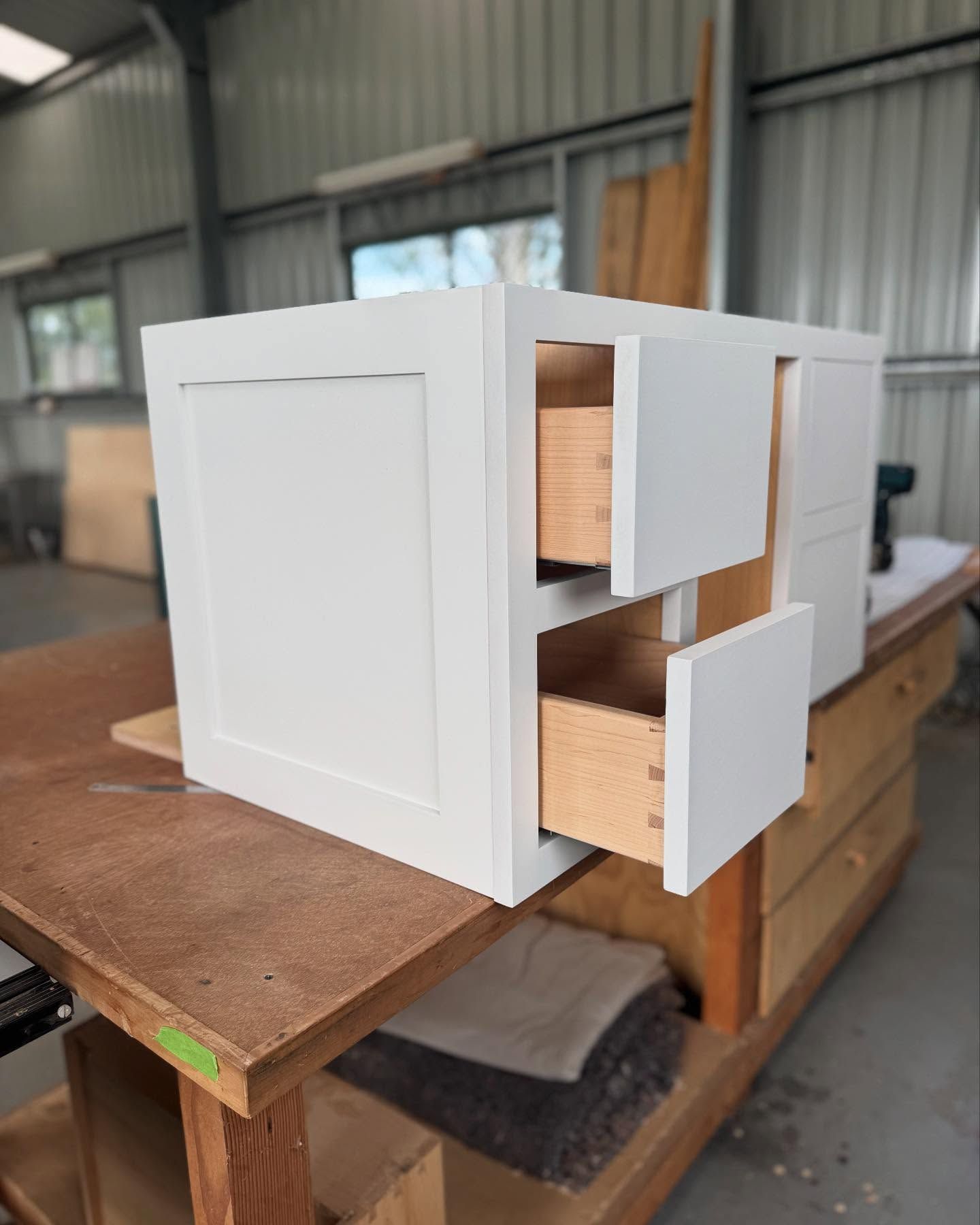 White Cabinet With Two Open Drawers On Workbench Showing Dovetail Joints — BC Customs in Burrell Creek, NSW