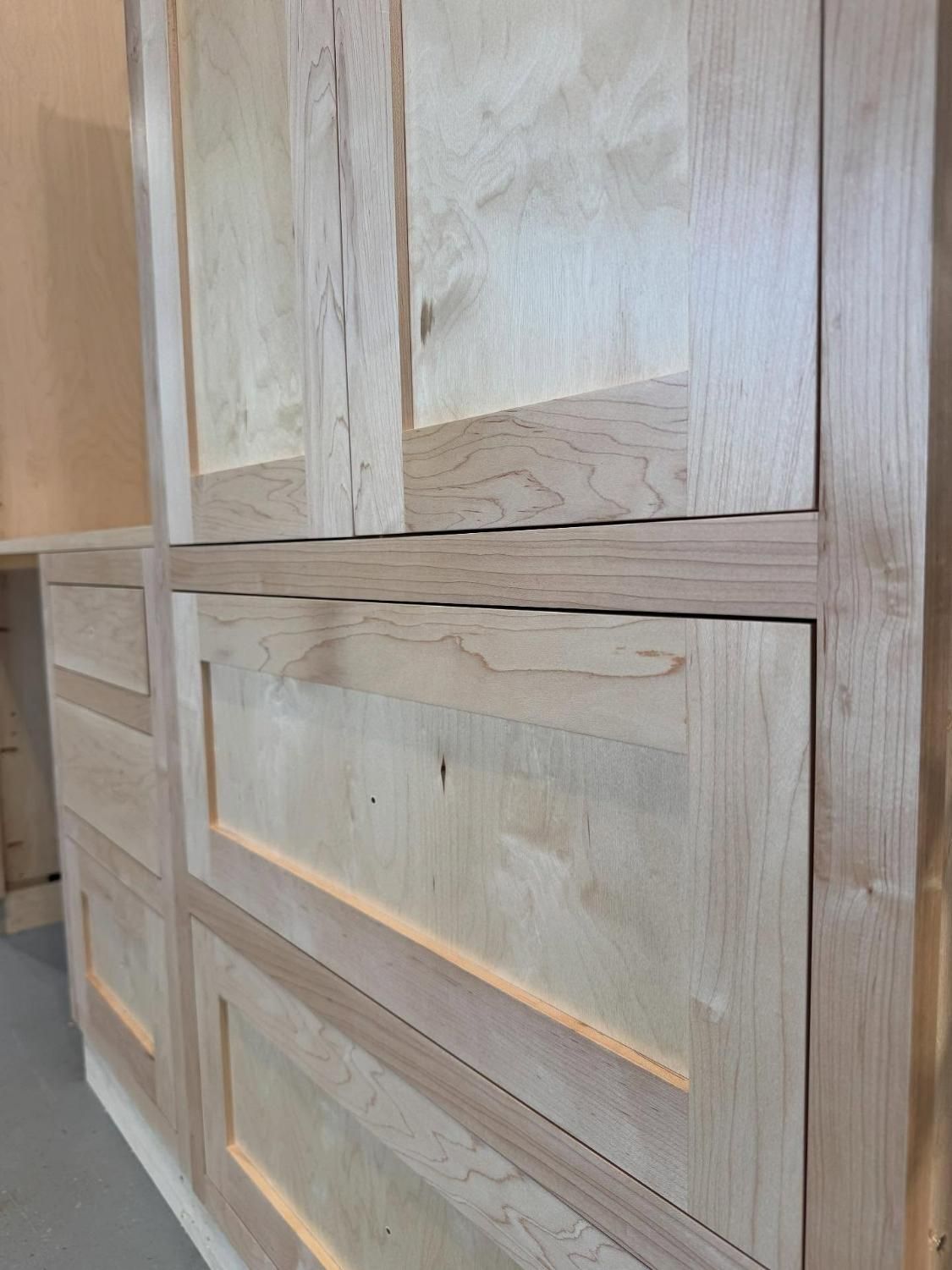 Light Wood Cabinets with Raised Panel Doors, Separated by A Horizontal Strip — BC Customs in Burrell Creek, NSW