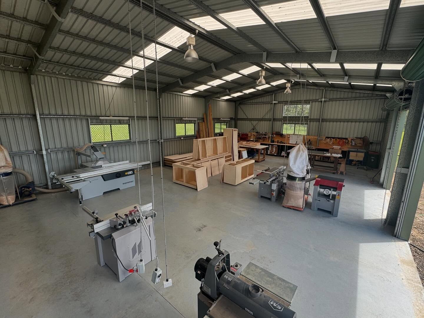 Woodworking shop interior with various machines, wooden workpieces — BC Customs in Burrell Creek, NSW